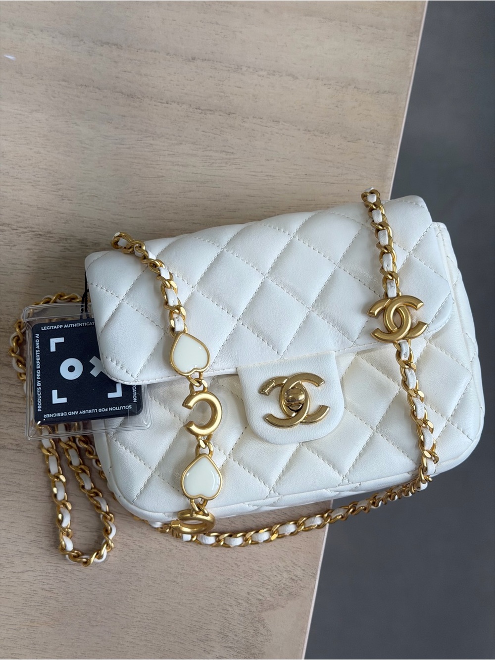 CHANEL Lambskin Enamel Quilted Mini Coco
Hearts Square Flap White